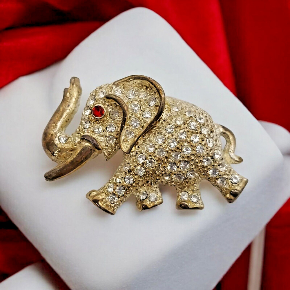 Vintage Rhinestone Elephant Brooch AD 2001 Red Eye Gold Tone Trunk Up Tusk Pin